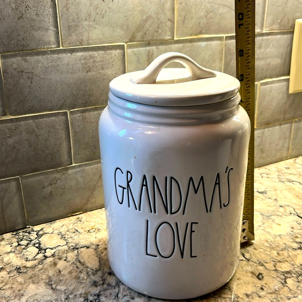 Rae Dunn canister. 9 inches tall approx 6 inches wide.